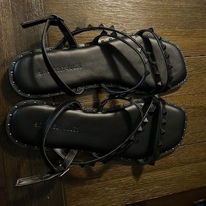 8.5 Black studded Sandals Only wore a couple times.